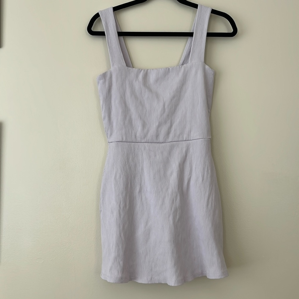Pink (VS) Dress in a light lavender shade.